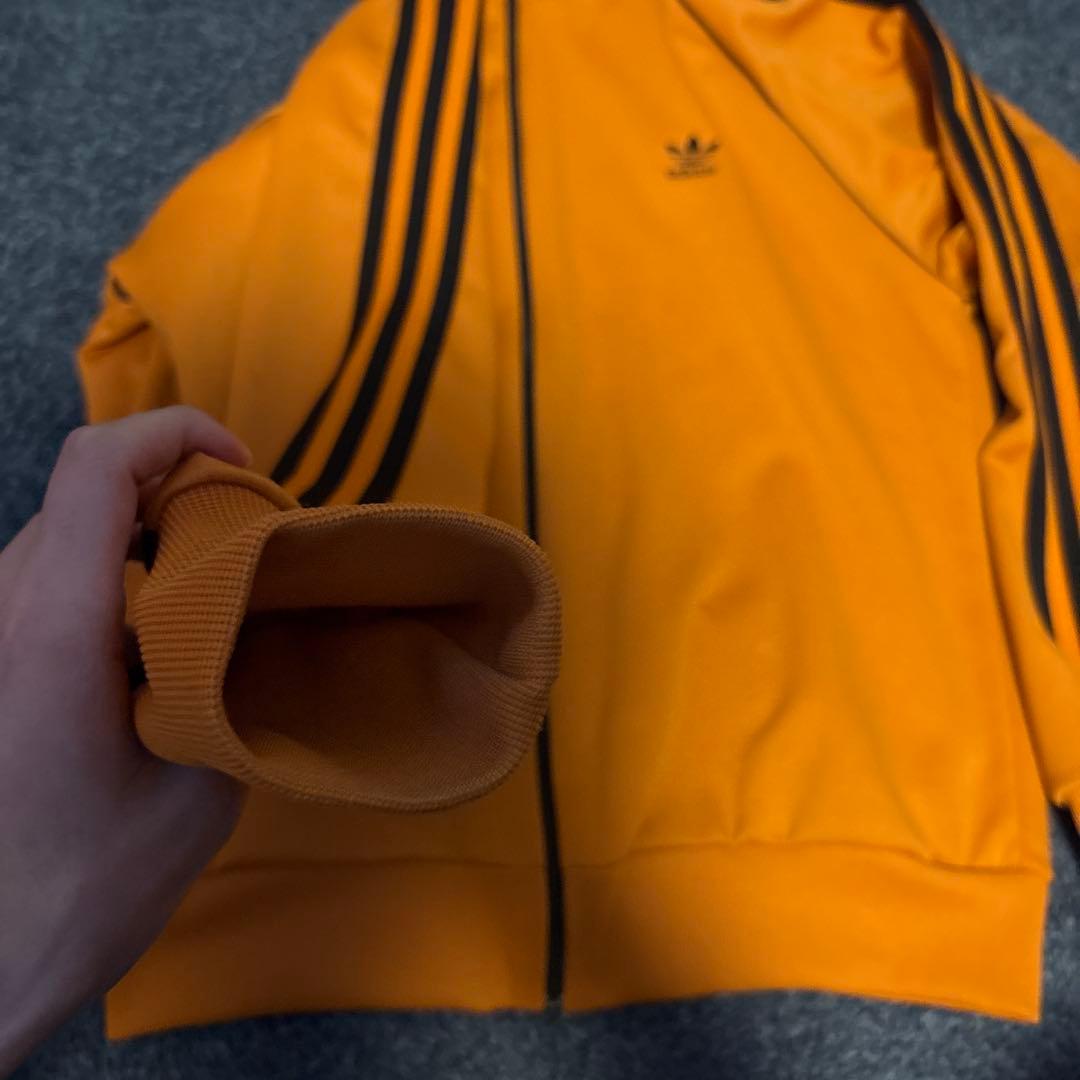 adidas アディダス トラックジャケット オレンジ 黒