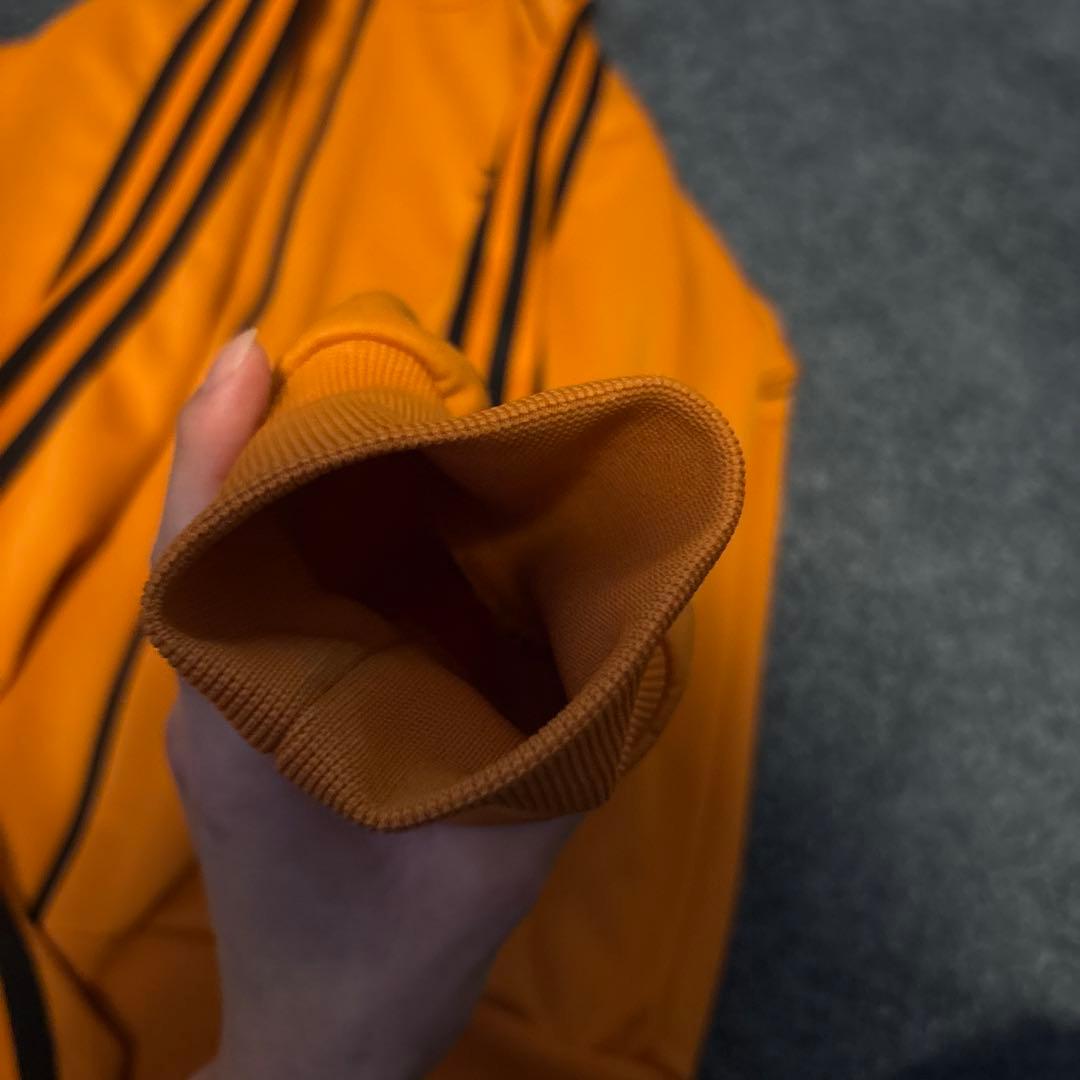 adidas アディダス トラックジャケット オレンジ 黒