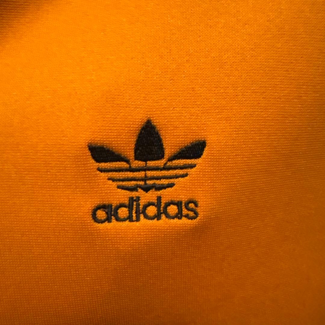 adidas アディダス トラックジャケット オレンジ 黒
