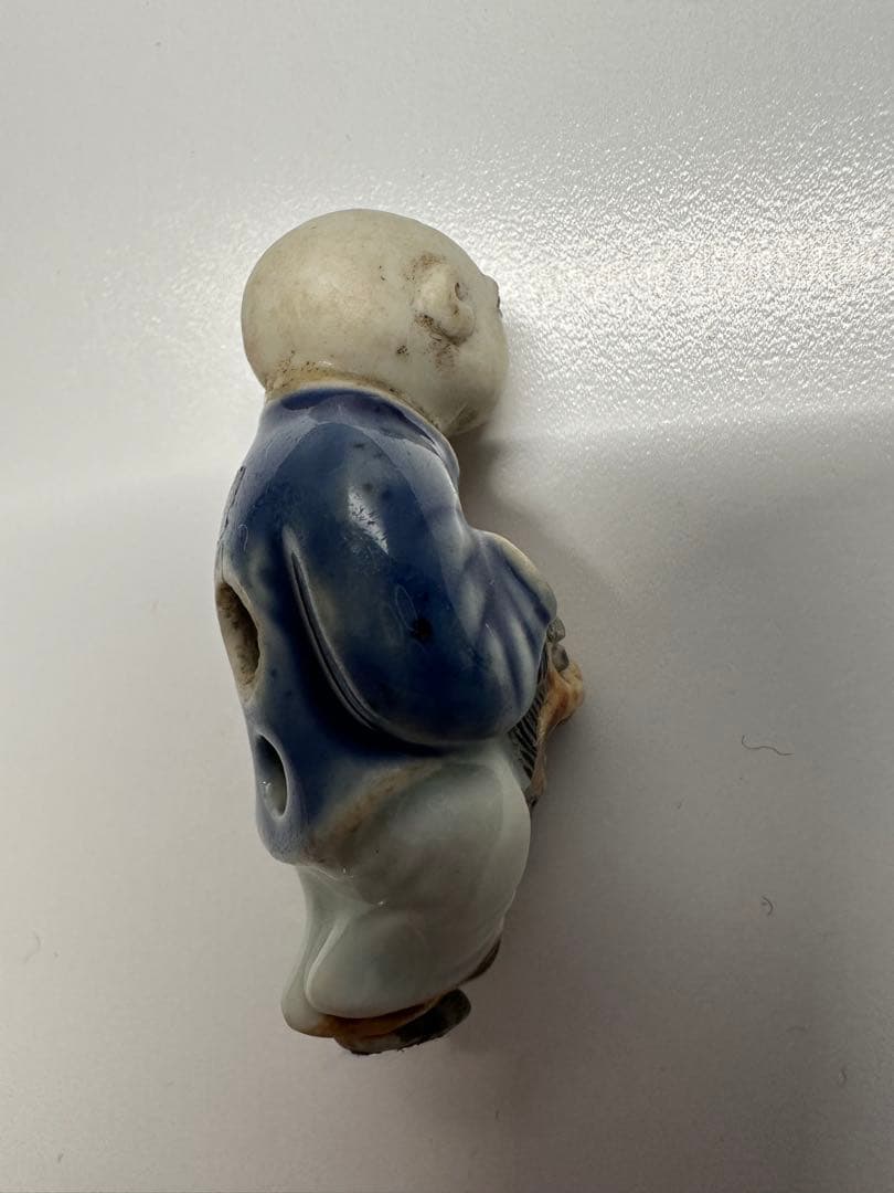 陶器根付　瑠璃青磁鉄釉獅子頭唐子根付