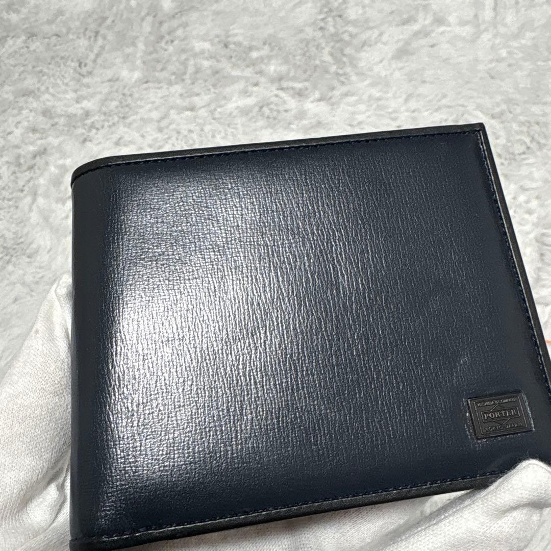 ポーター　プリュム　二つ折り財布　ロゴプレート　ネイビー　レザー