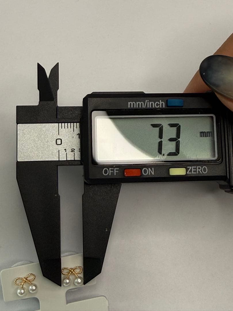 K18 リボン型ベビーアコヤパール付きピアス