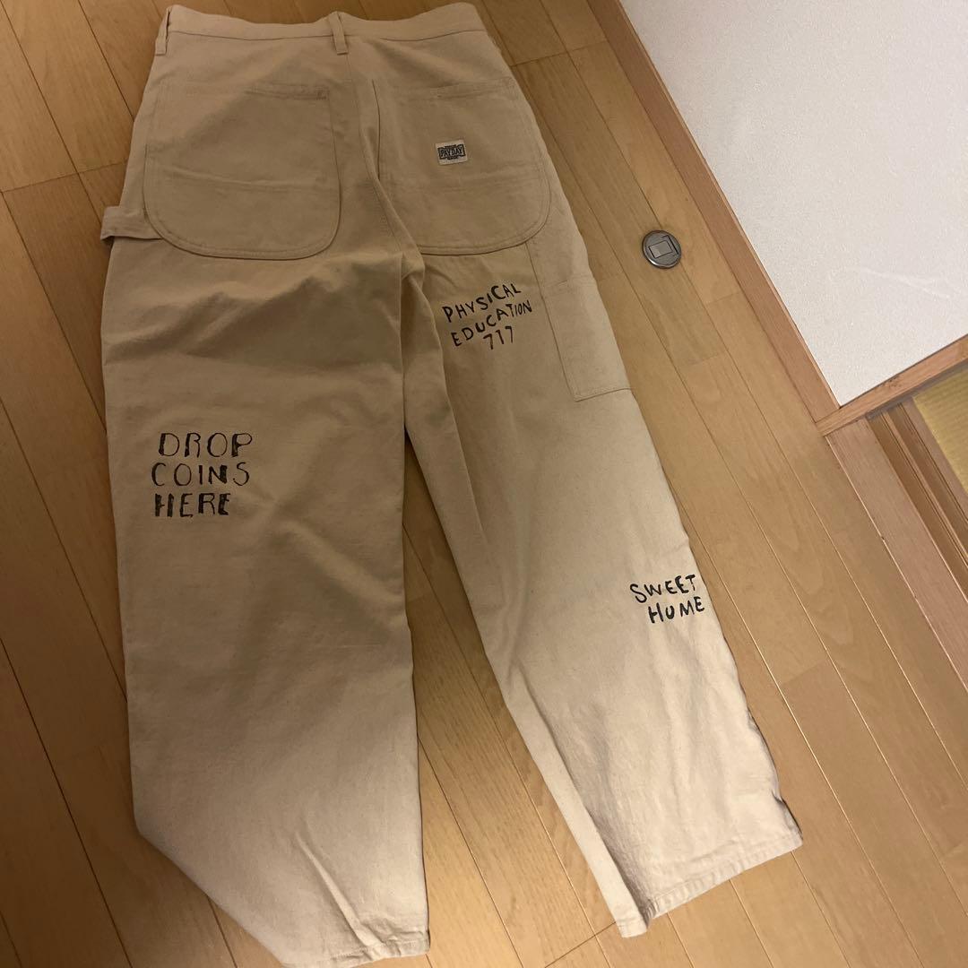 framework プリント入りクリーム色ワークパンツ