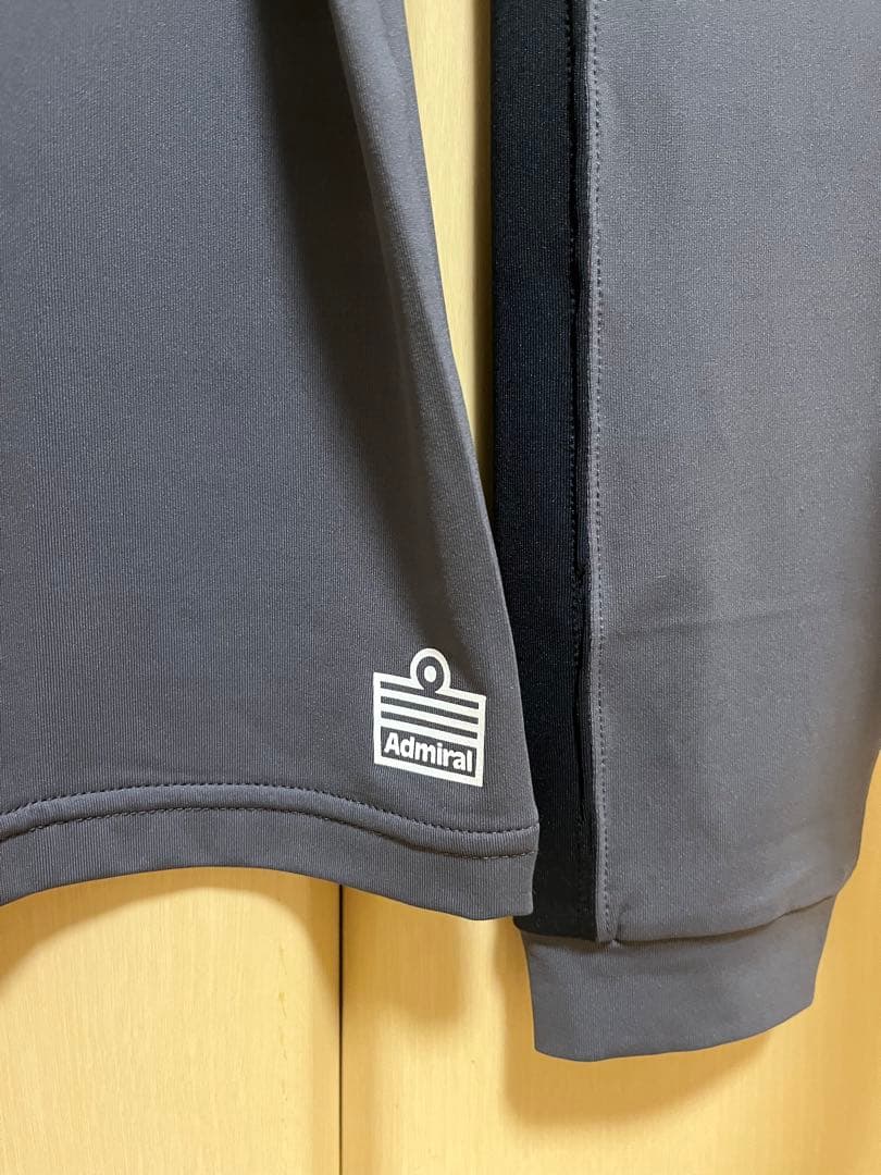 アドミラル ミニマムサイドラインL/S TEE チャコール(ATLA438)