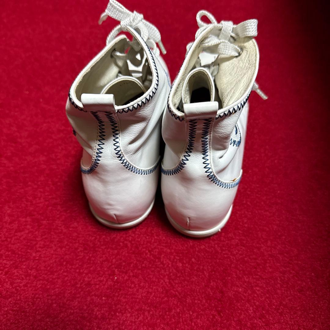 CNA HELホワイト ハイカットスニーカー