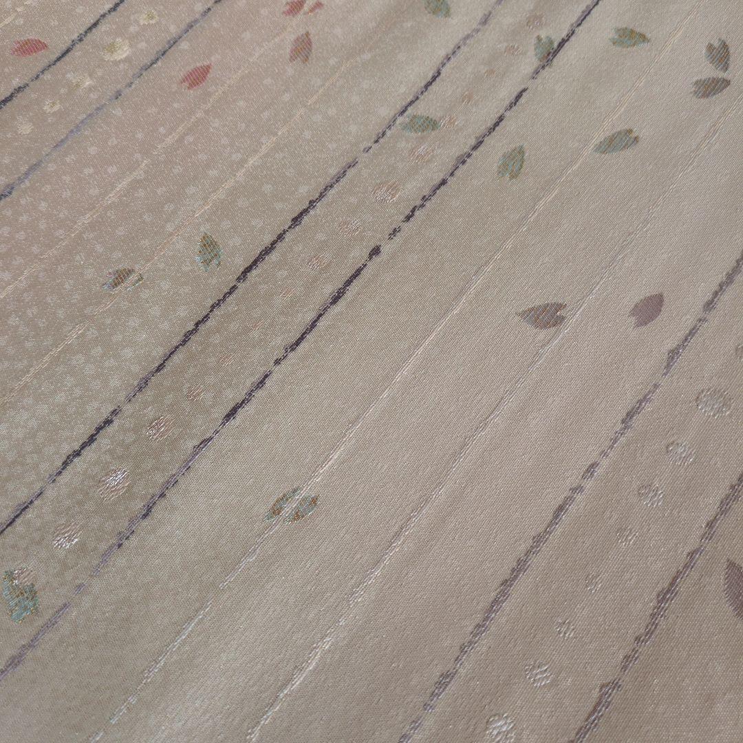 未使用　正絹袋帯　河瀬満織物　横段に花弁散らし　証紙アリ