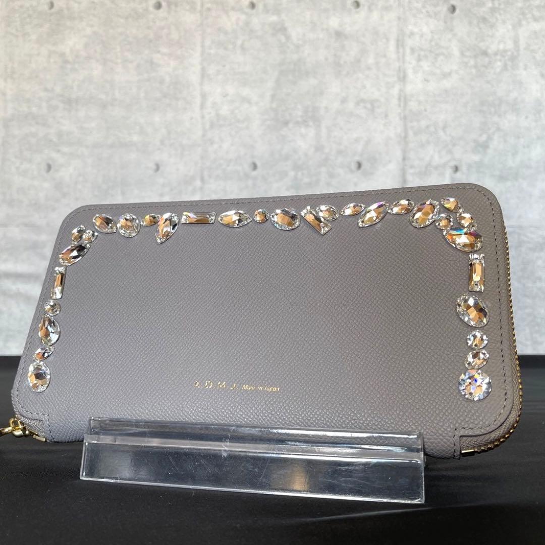 専用品A.D.M.J スワロフスキー グレー ラウンドジップ ウォレット