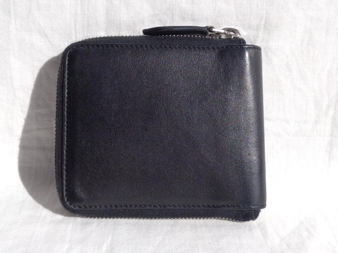 美品 BALENCIAGA パンチングロゴレザーラウンドジップ二つ折り財布 黒