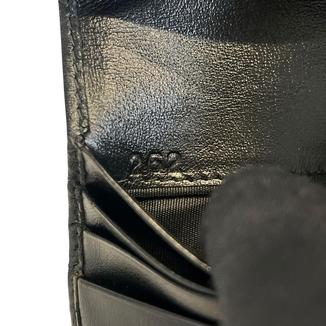 現行品✨ミュウミュウ 二つ折り財布 エンボス ロゴ 総柄 レザー 黒