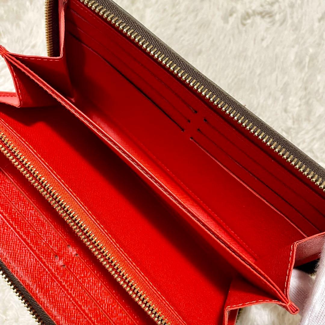 ルイヴィトン モノグラム ステッカー ジッピーウォレット コクリコ M62149