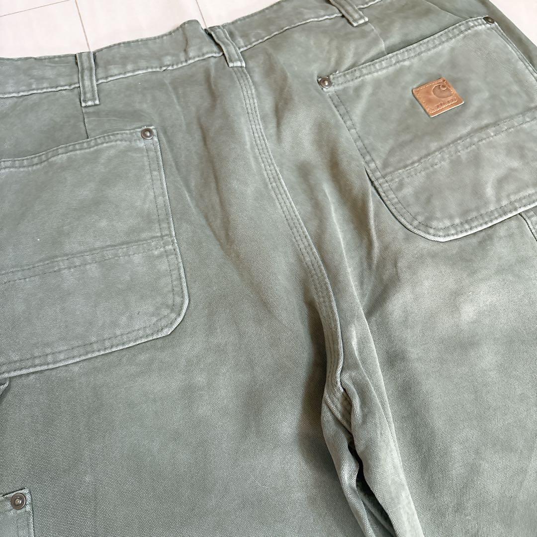 カーハート ワークパンツ w34 オリーブ ロゴ古着 ダブルニー