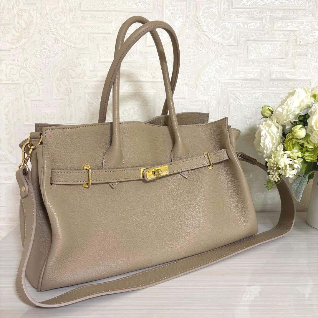 m*.様 MILOS/ミロス 金具付きショルダーバッグ　ベージュ　NOBLE