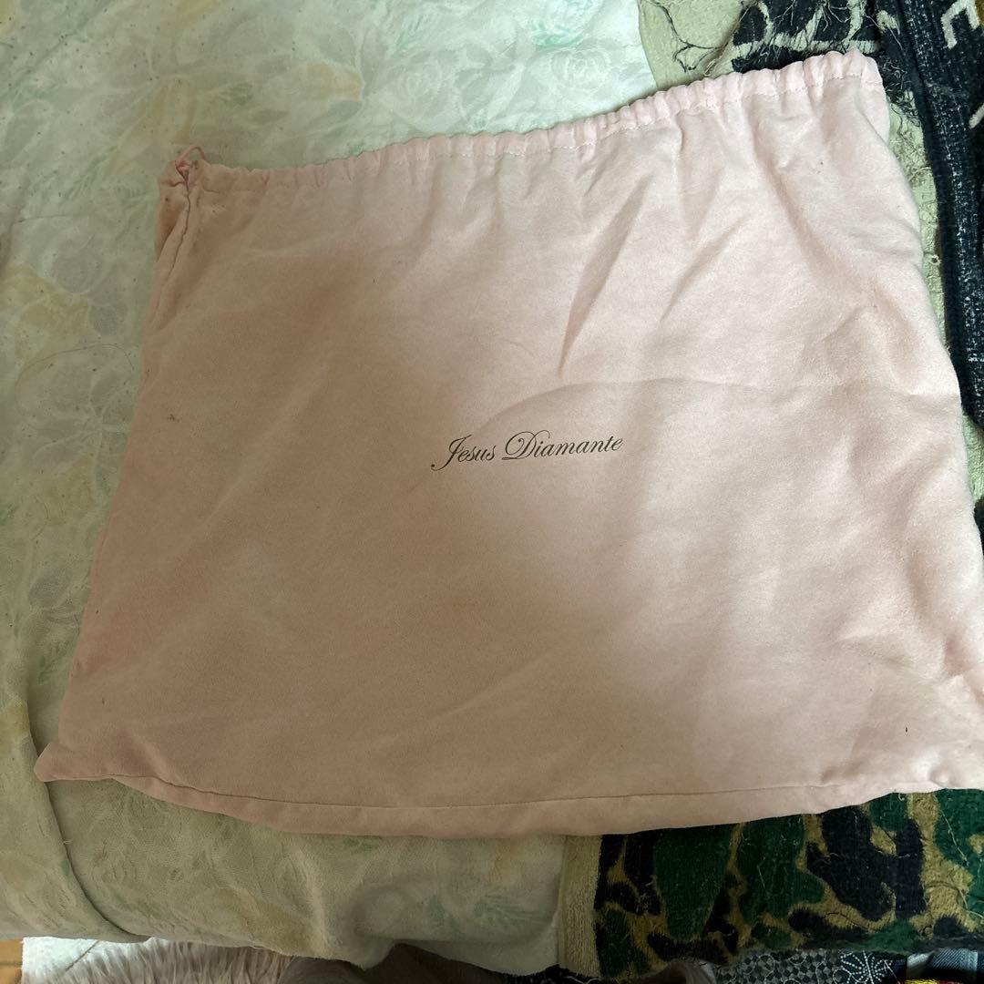 花柄リボン付ジーザスディアマンテのバッグ