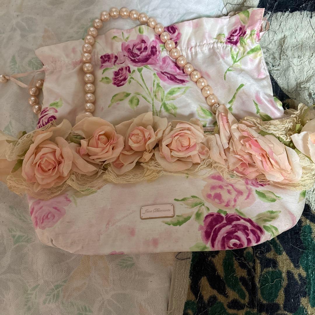 花柄リボン付ジーザスディアマンテのバッグ