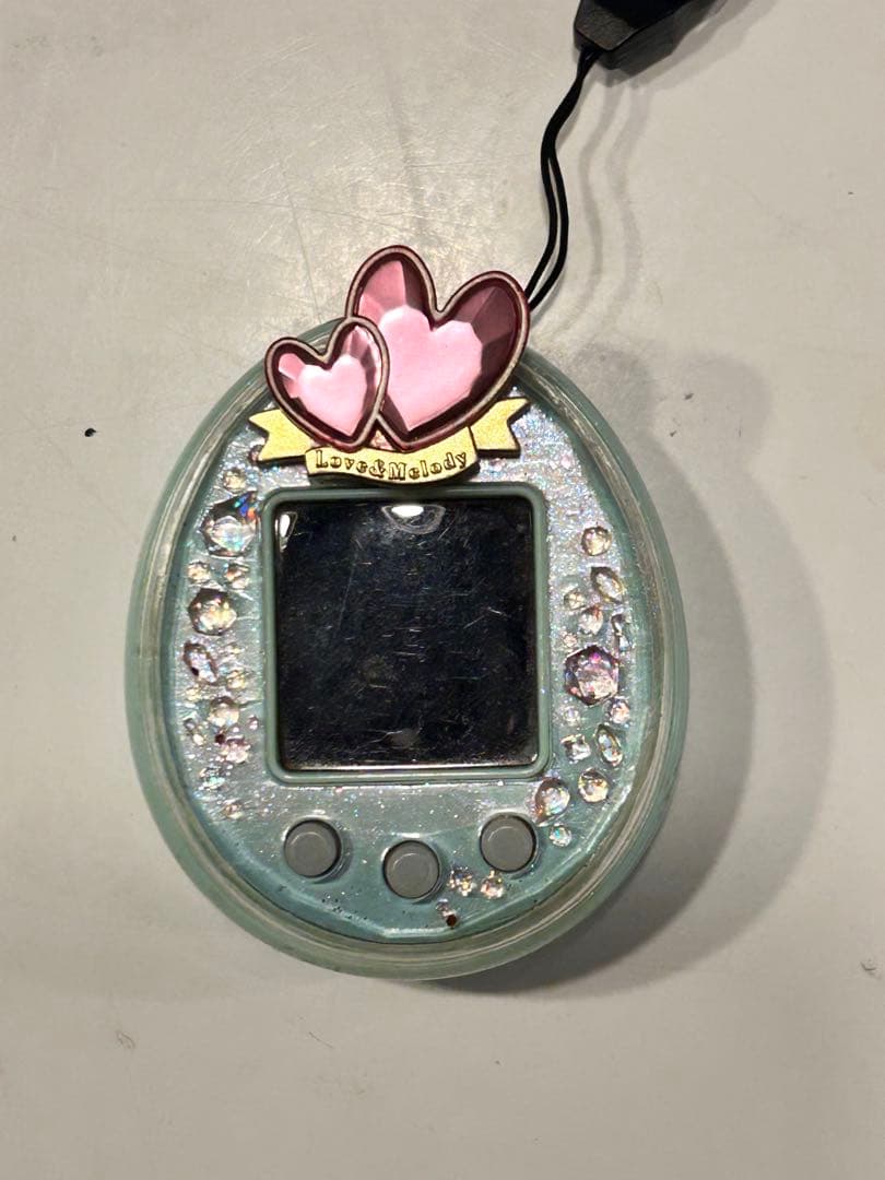 たまごっちピース グリーン 激レアたまデコピアス　ラブメロ　ver.