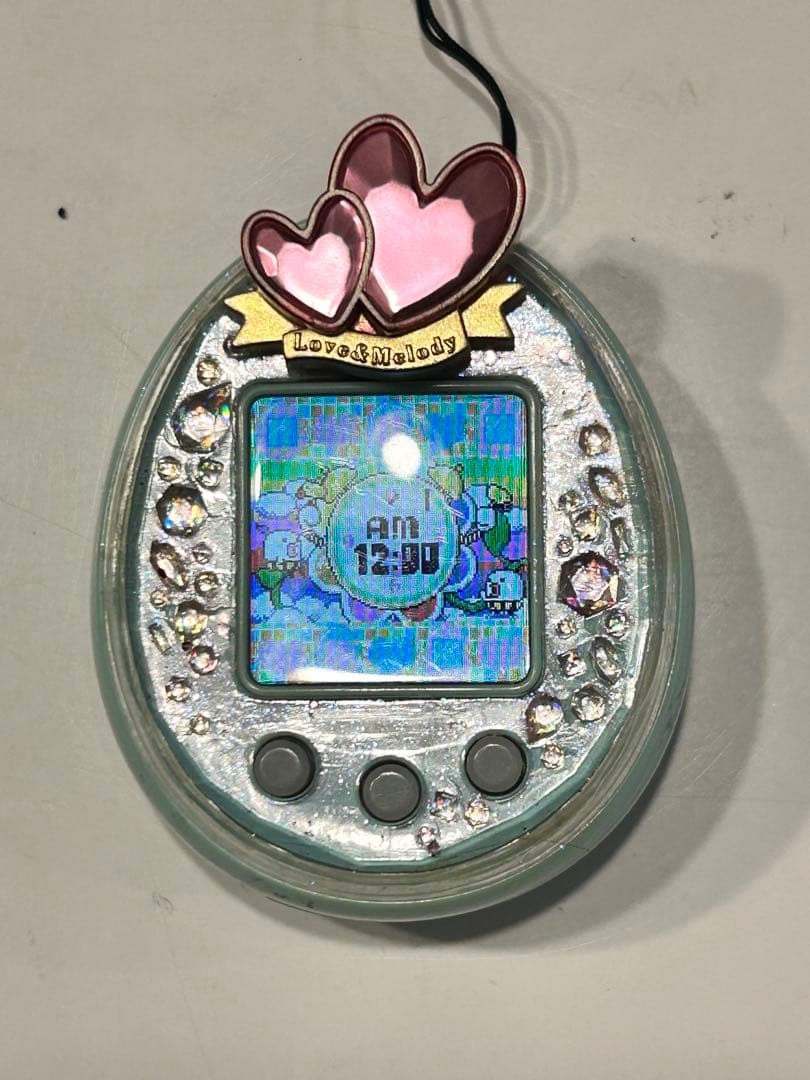 たまごっちピース グリーン 激レアたまデコピアス　ラブメロ　ver.