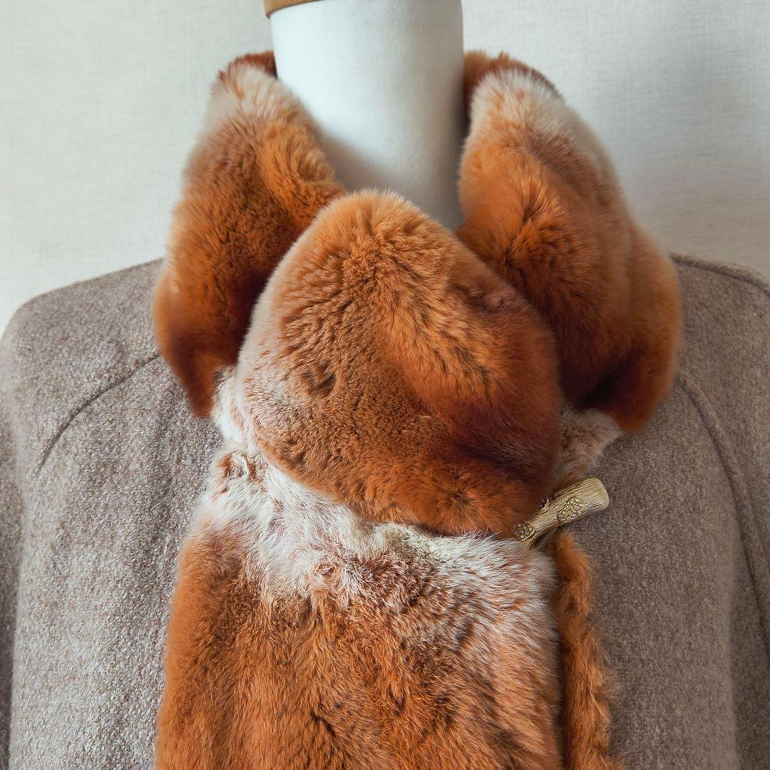 伊太利屋 ベージュとオレンジ ファーつきコート 11号 金ボタン