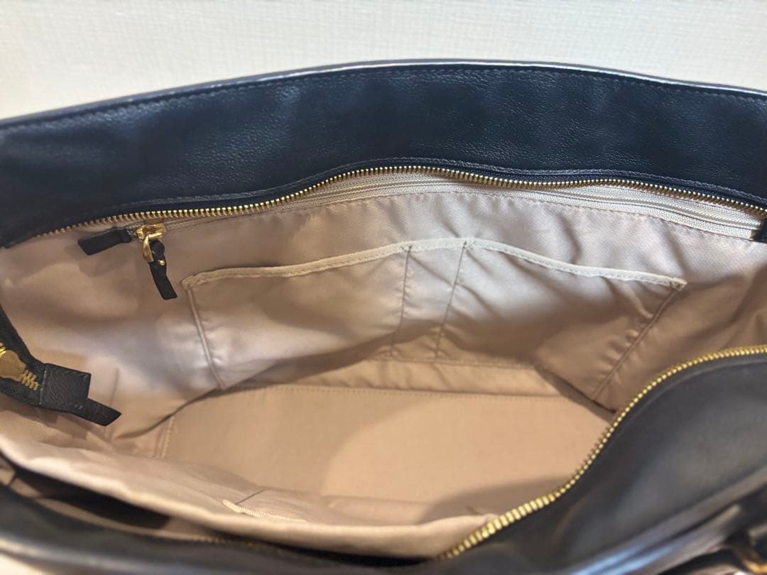 TUMI ブラック レザートートバッグ