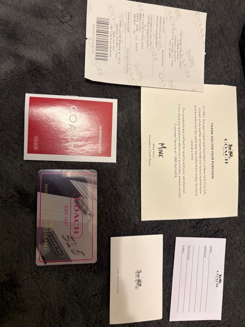 未使用・保存袋・説明書・ストラップ付き　COACH ブラック リュック