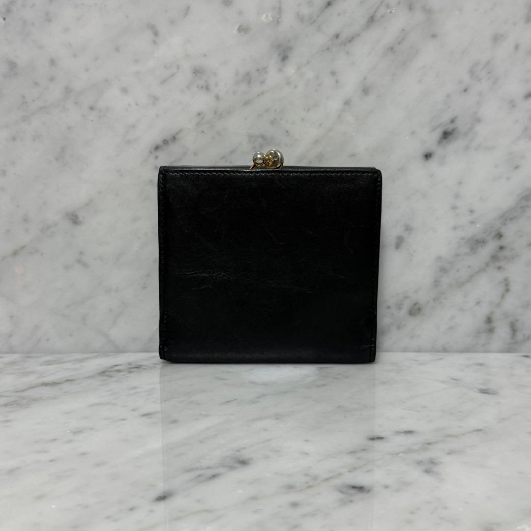 サルヴァトーレフェラガモ 三つ折り財布 ブラック ゴールド ヴァラリボン がま口