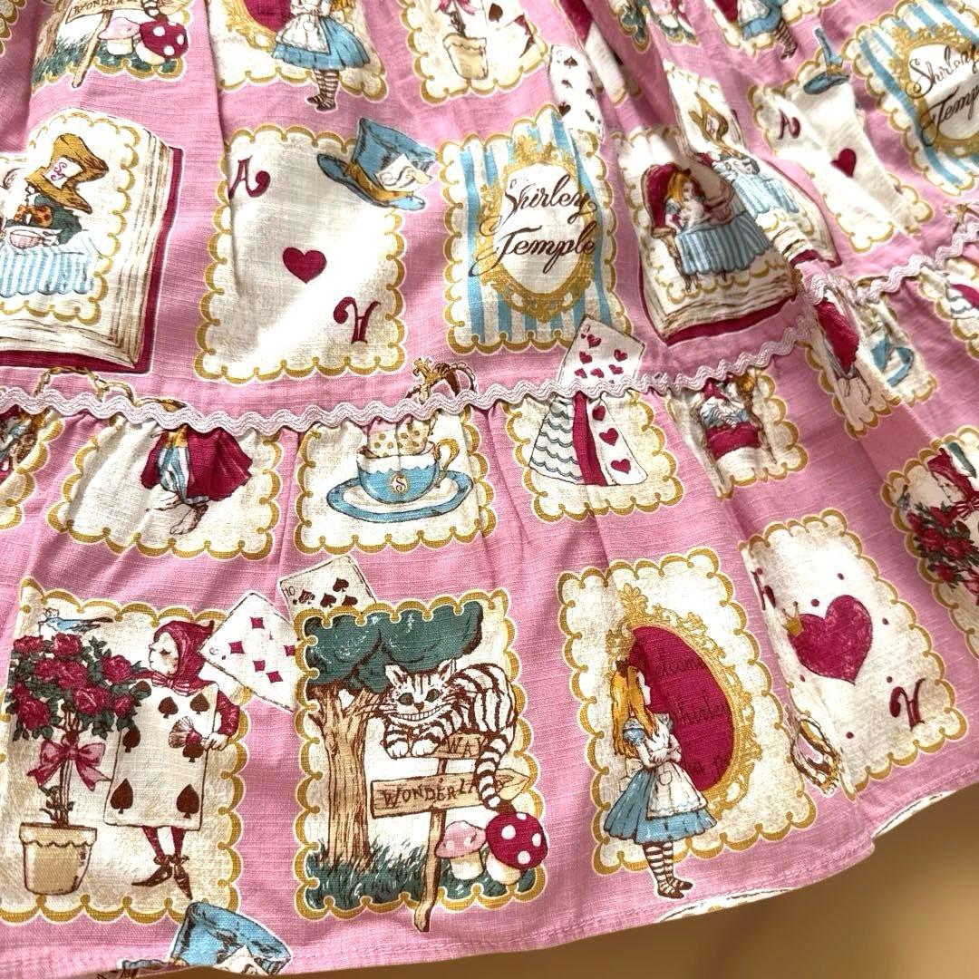 美品　シャーリーテンプル　不思議の国のアリス 絵本プリントワンピースピンク140