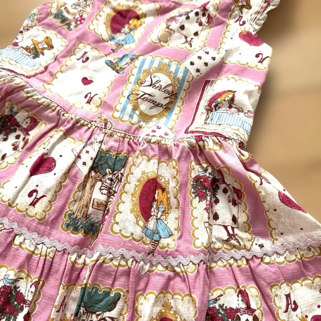 美品　シャーリーテンプル　不思議の国のアリス 絵本プリントワンピースピンク140