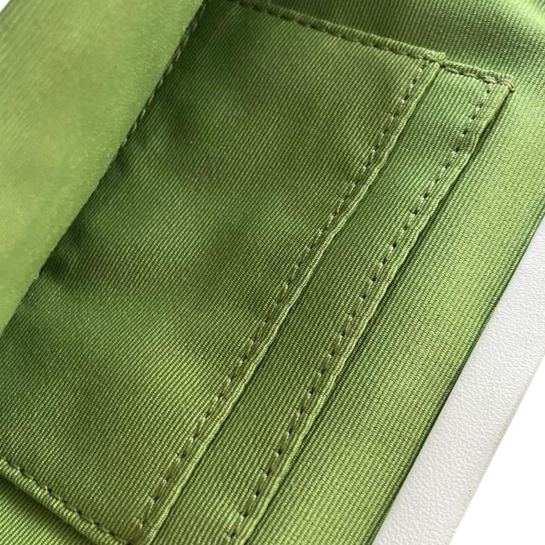 コーチ　がま口 花刺繍 蜂 キャンバス レザー ポーチ