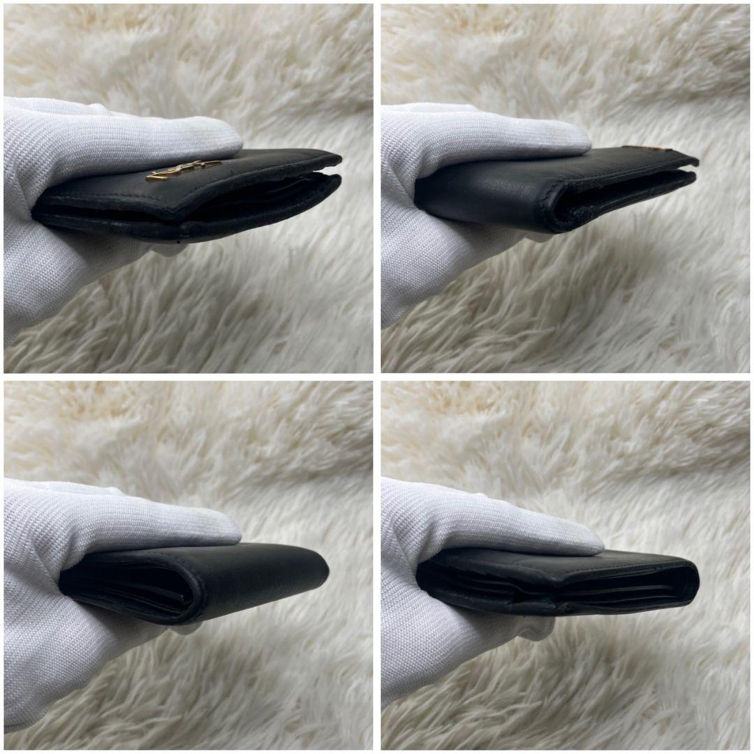 サンローラン 二つ折り財布 レザー カサンドラ 金具 ロゴ 黒 小銭入れ