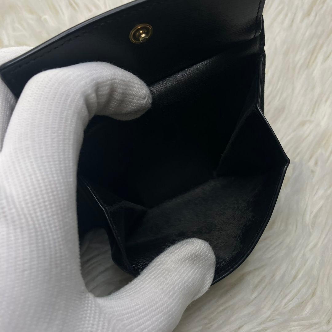 サンローラン 二つ折り財布 レザー カサンドラ 金具 ロゴ 黒 小銭入れ