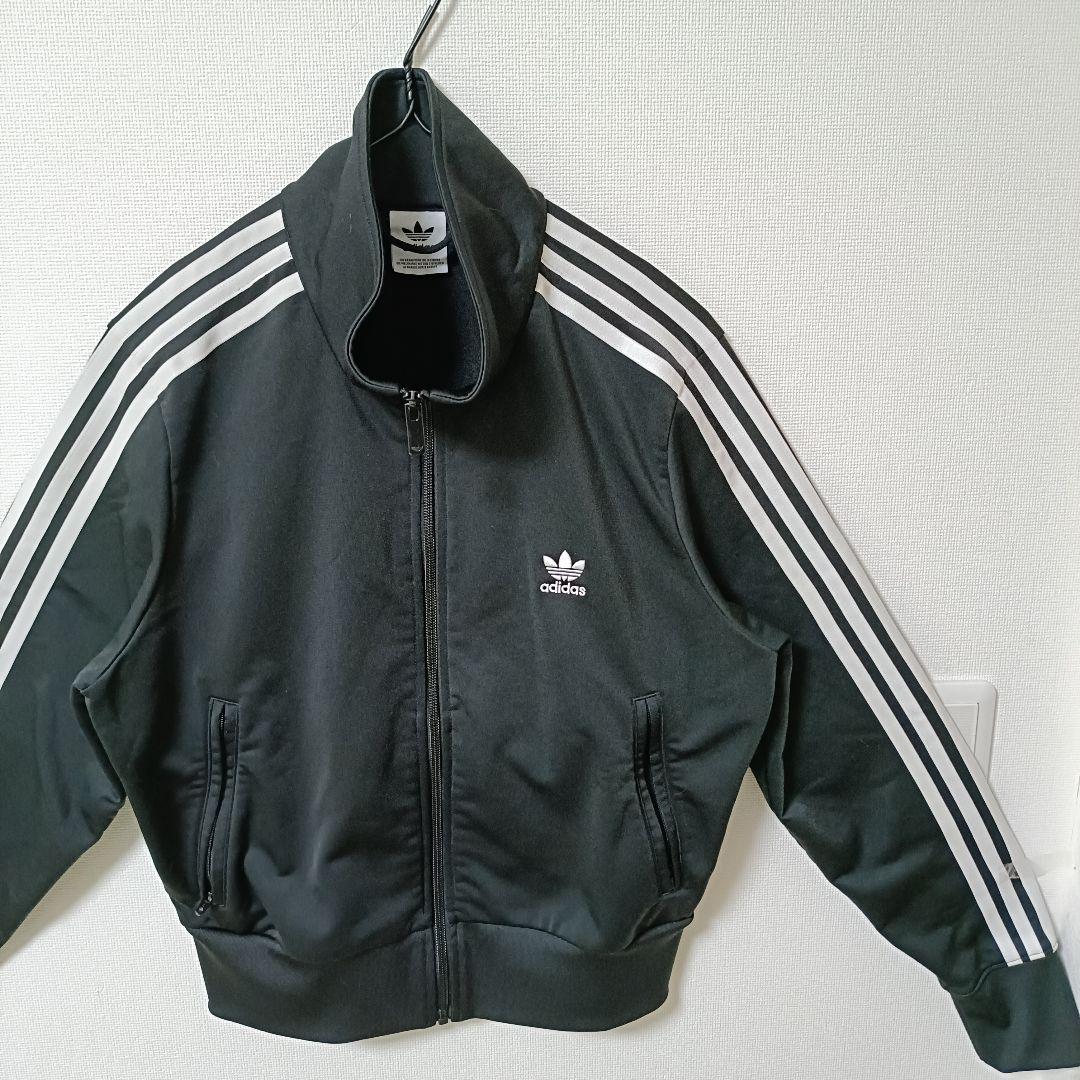 アディダス 黒 ファイヤーバード 襟高 トラックトップ ジャージ女性XL人気短丈