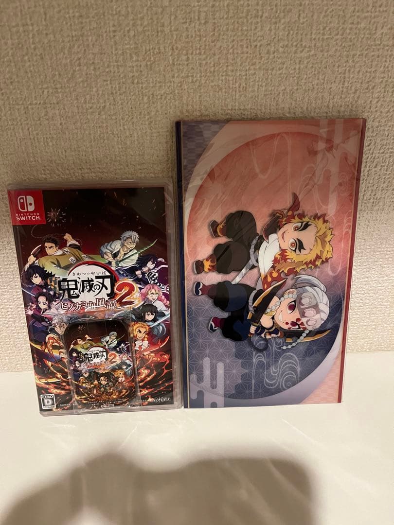 【新品未開封】鬼滅の刃 ヒノカミ血風譚２ マルチケース+缶バッチ　1点