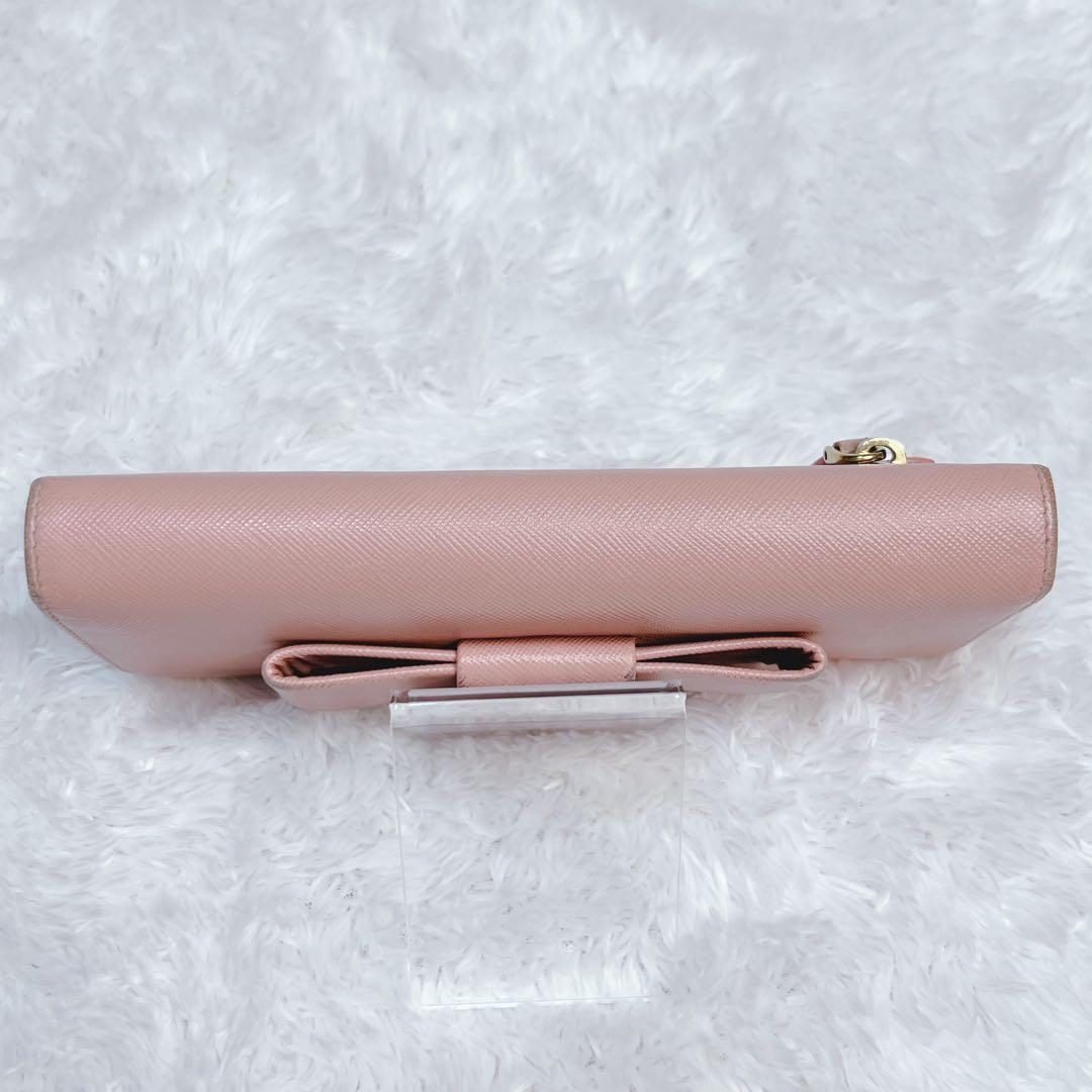 PRADA プラダ　長財布　サフィアーノ　フィオッコ　メタルロゴ　ピンク　リボン