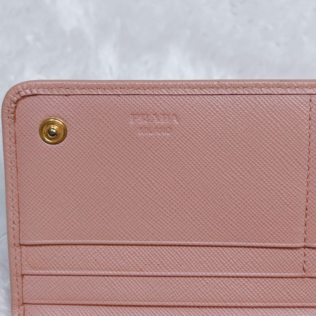 PRADA プラダ　長財布　サフィアーノ　フィオッコ　メタルロゴ　ピンク　リボン