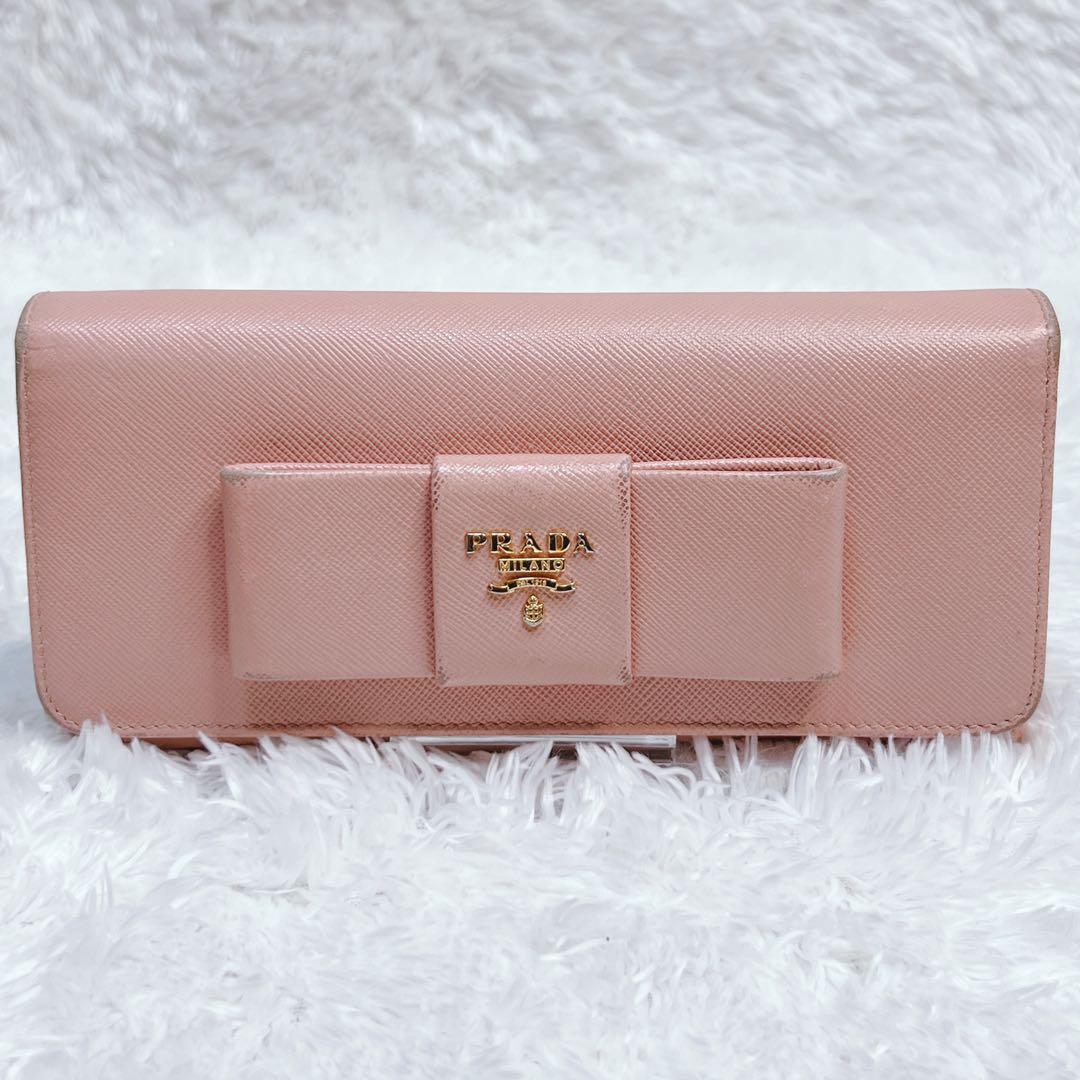 PRADA プラダ　長財布　サフィアーノ　フィオッコ　メタルロゴ　ピンク　リボン
