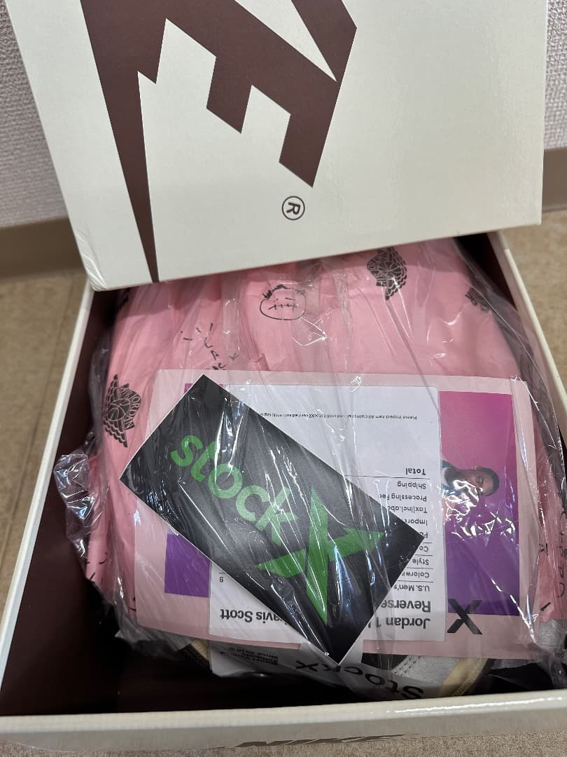 Travis Scott × Nike Air Jordan 1 Low OG