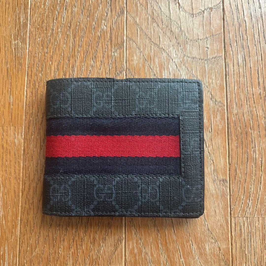 GUCCI 二つ折り財布 黒 赤ストライプ