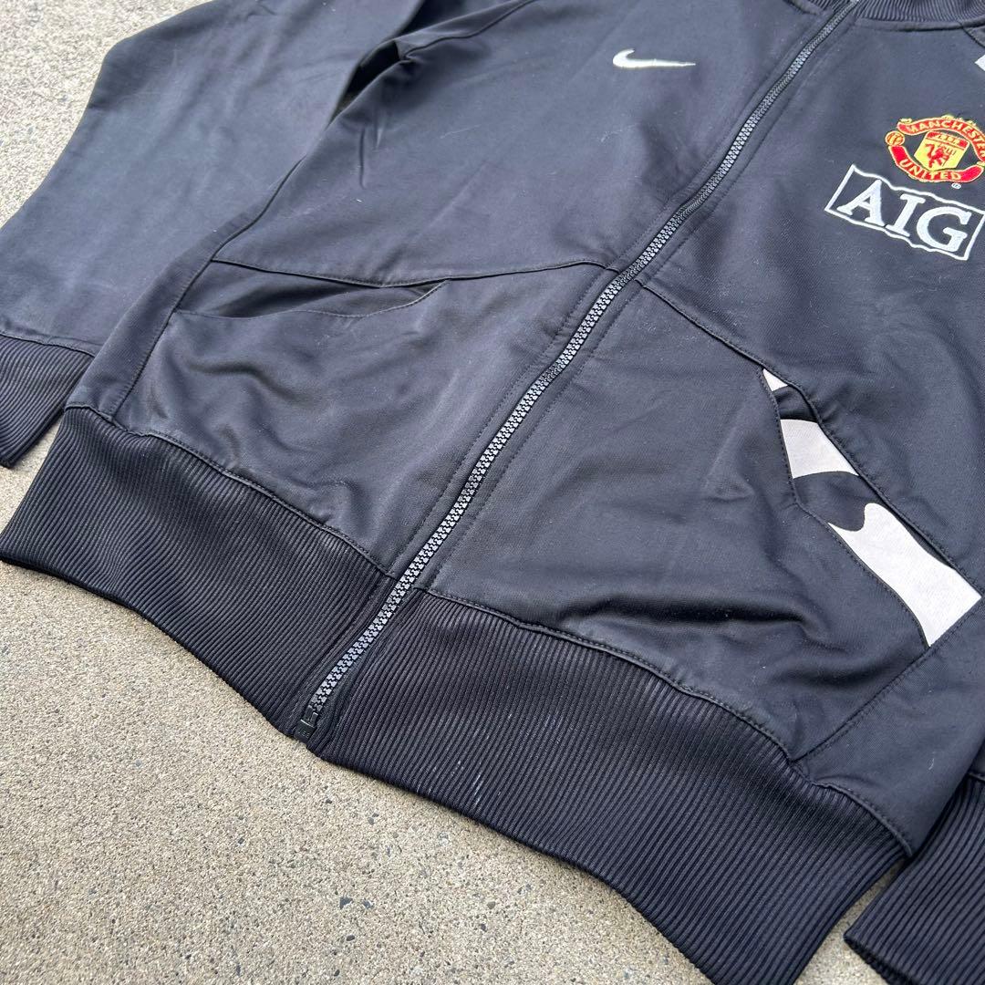 【希少】マンチェスター・ユナイテッド トラックジャケット L相当 黒 ロゴ刺繍