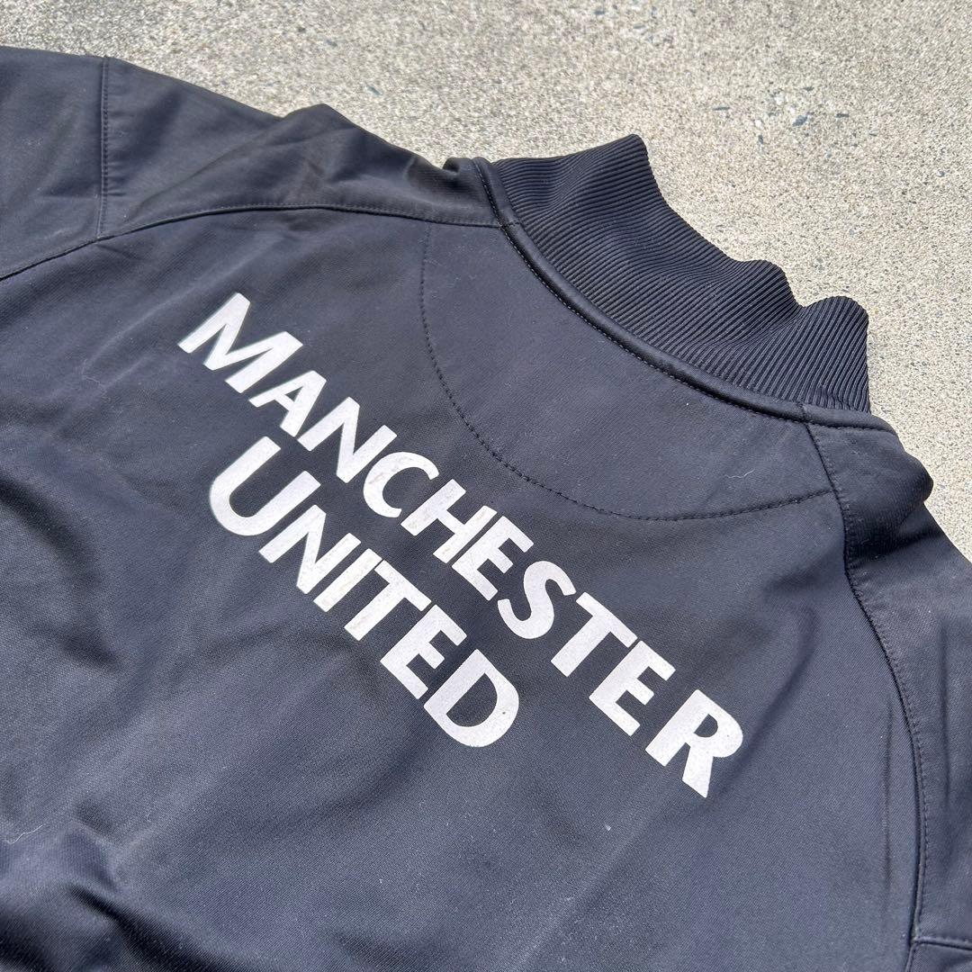 【希少】マンチェスター・ユナイテッド トラックジャケット L相当 黒 ロゴ刺繍