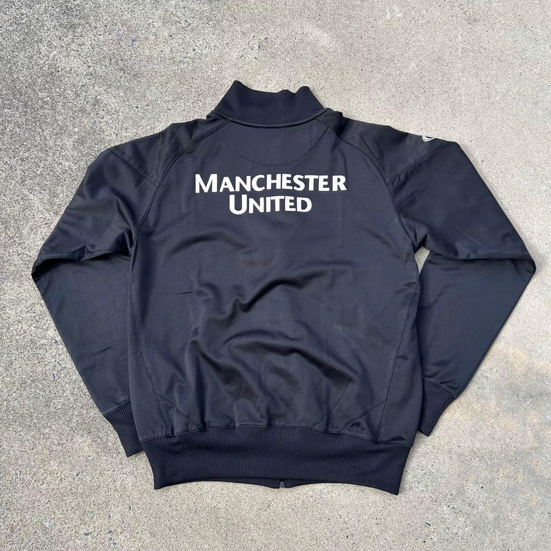 【希少】マンチェスター・ユナイテッド トラックジャケット L相当 黒 ロゴ刺繍