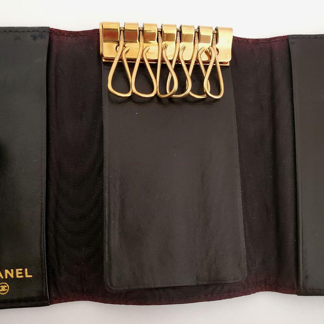 【美品】シャネル エンボスCOCOキャビアスキン 6連キーケース 黒〈K-013