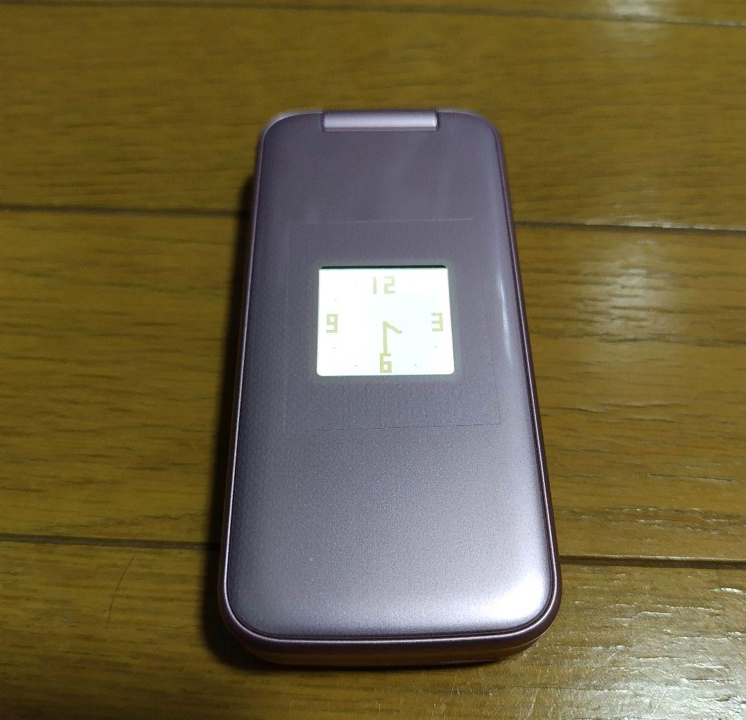 ドコモ　F-01M ガラケー　らくらくホン ピンク　純正卓上ホルダー付き