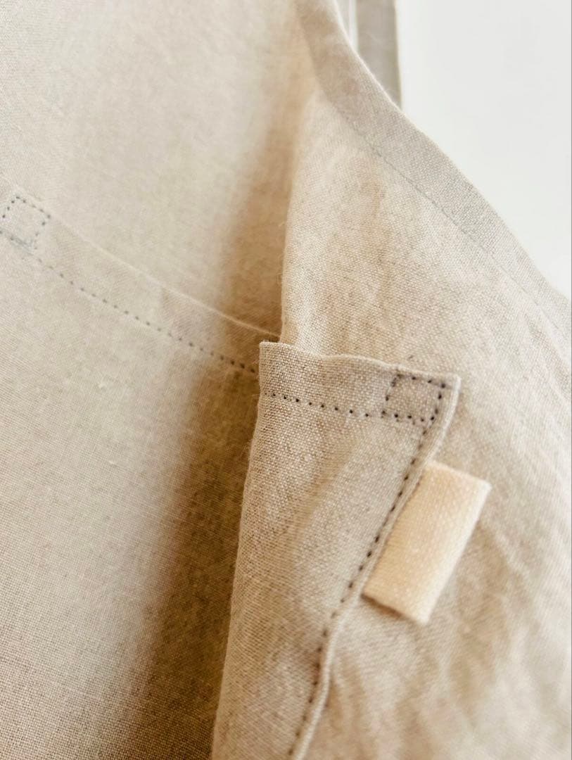 norikoページ 天日干しリネンエプロン 墨黒：ベージュ