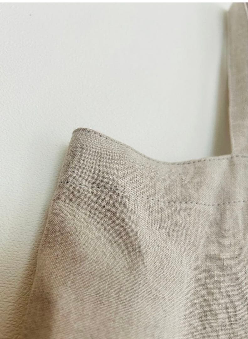 norikoページ 天日干しリネンエプロン 墨黒：ベージュ