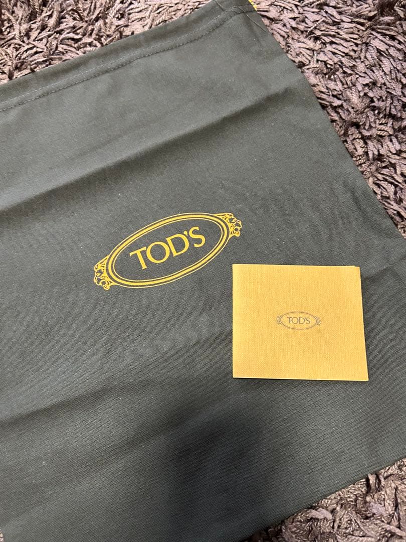 TOD'S ホワイトレザー スニーカー リボン付き