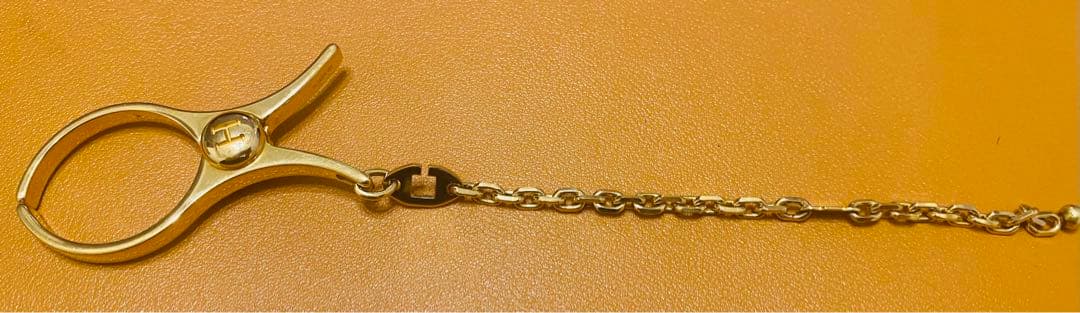 エルメス　グローブホルダー　ゴールド