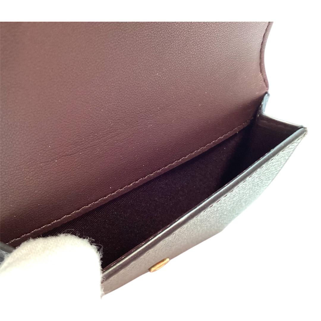 【新品/即発送】コーチ正規品　アメリカアウトレット　シグネチャー　二つ折り財布