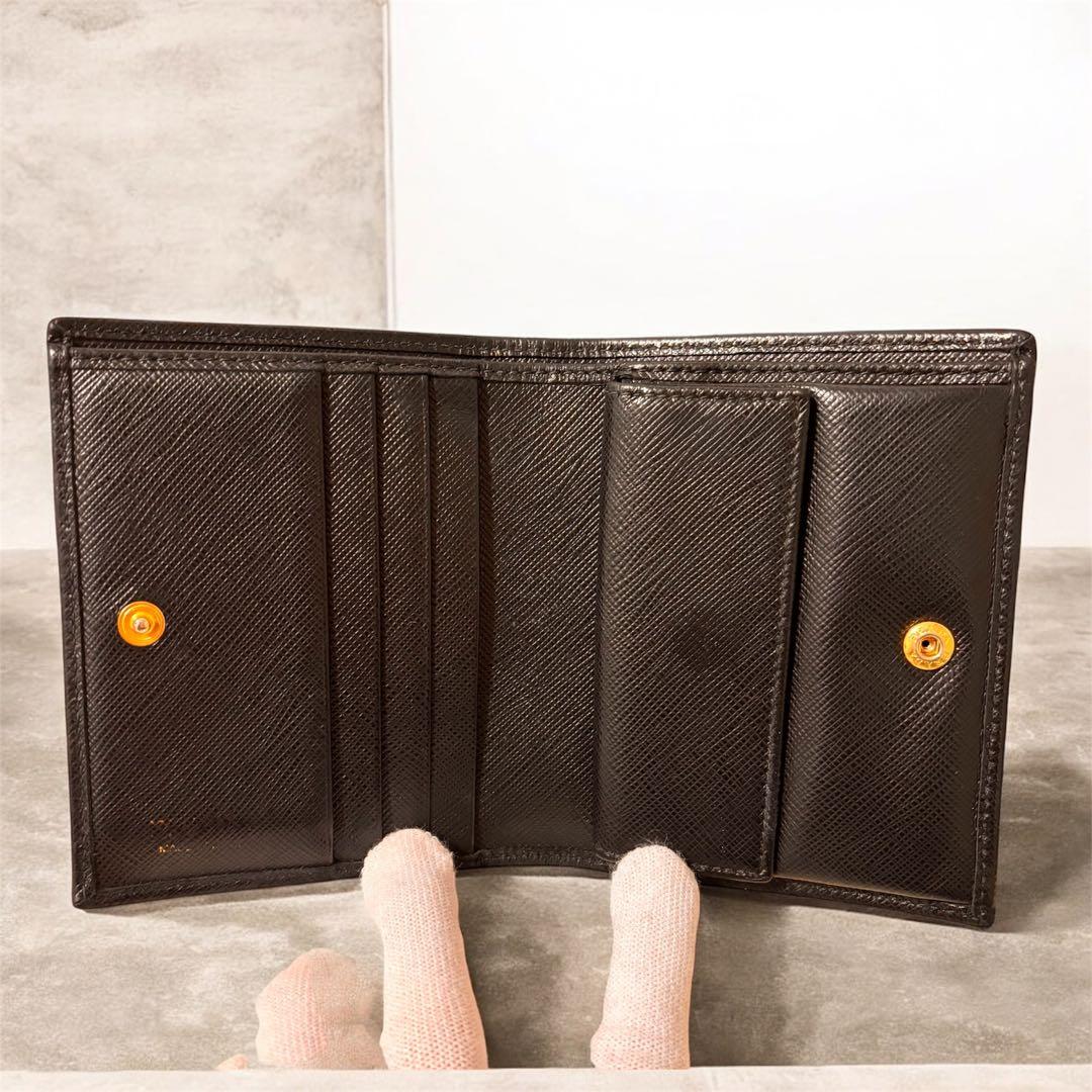 PRADA プラダ 服飾小物二つ折り財布　シリアル85