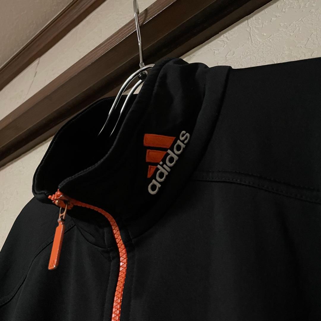 adidas トラックJKT Lサイズ オレンジ/ブラック パフォーマンスロゴ