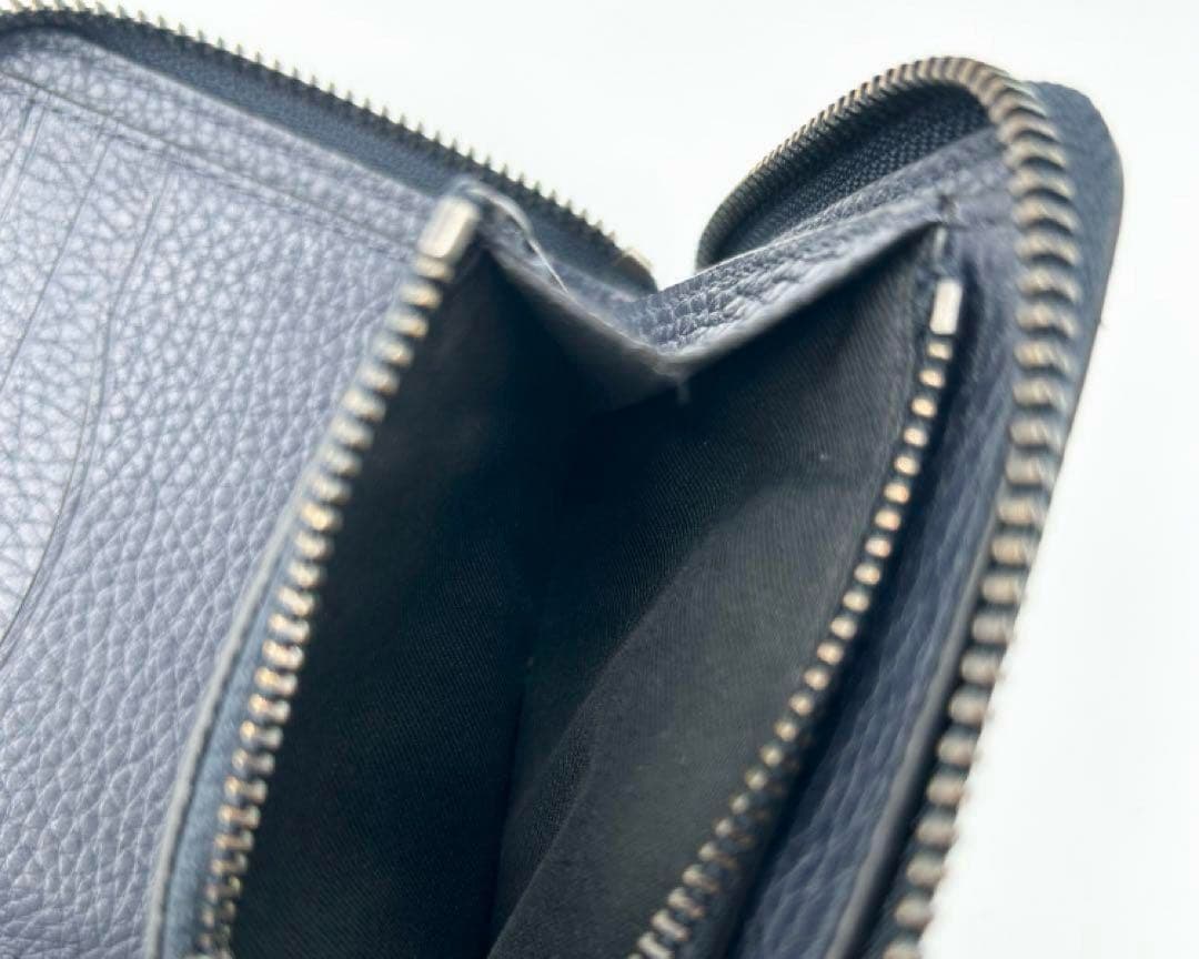 coach コーチ　二つ折り財布　ラウンドファスナー　ロゴ型押し　レザー　シボ革