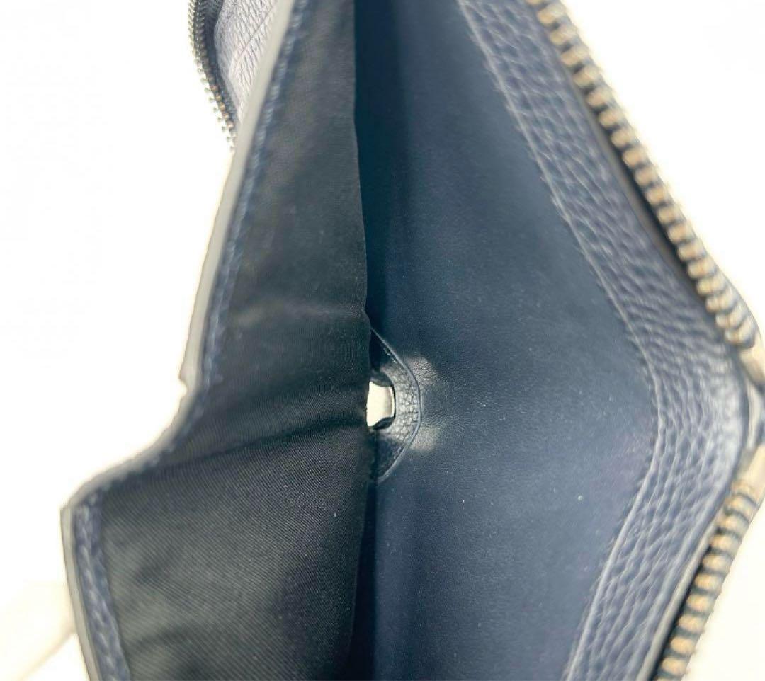 coach コーチ　二つ折り財布　ラウンドファスナー　ロゴ型押し　レザー　シボ革